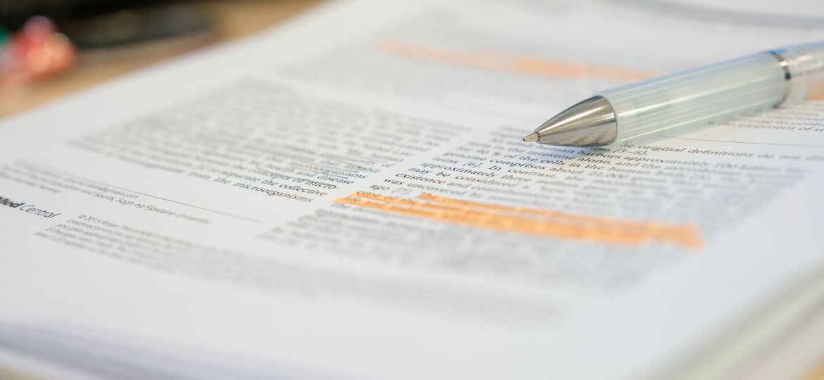 Pencil,Placed,On,Scientific,Journal,Paper,With,Highlight,Color