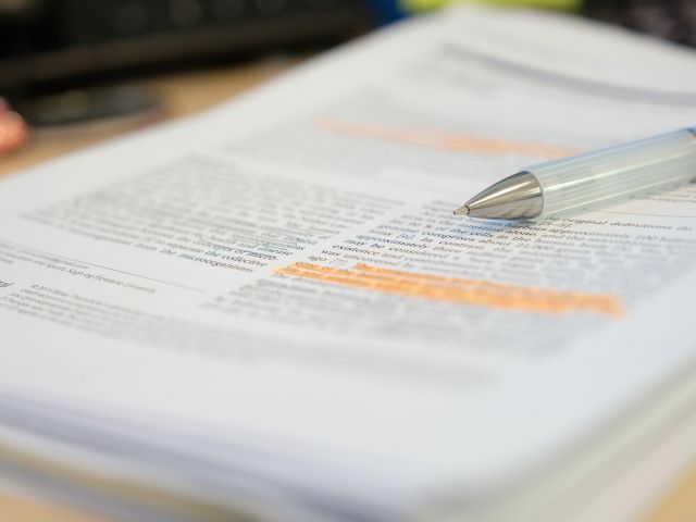 Pencil,Placed,On,Scientific,Journal,Paper,With,Highlight,Color