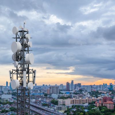 Telecommunication,Tower,With,5g,Cellular,Network,Antenna,On,City,Background